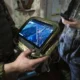 Concept art demonstrating security by obsolescence with older tech evading hackers